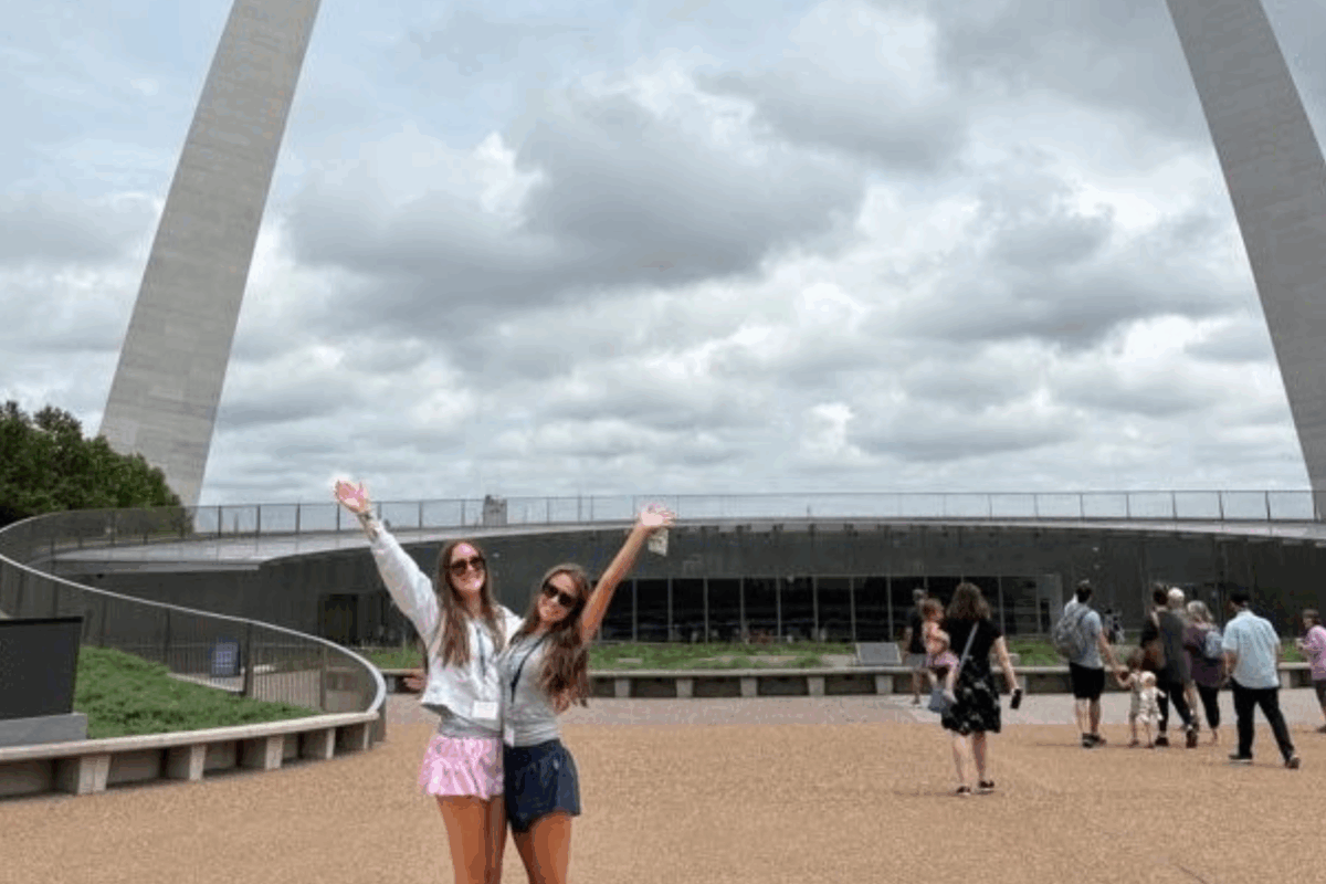 students posing outside st louis arch