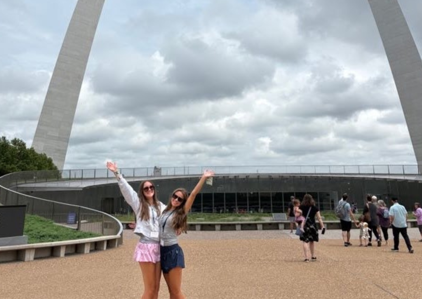 students posing outside st louis arch