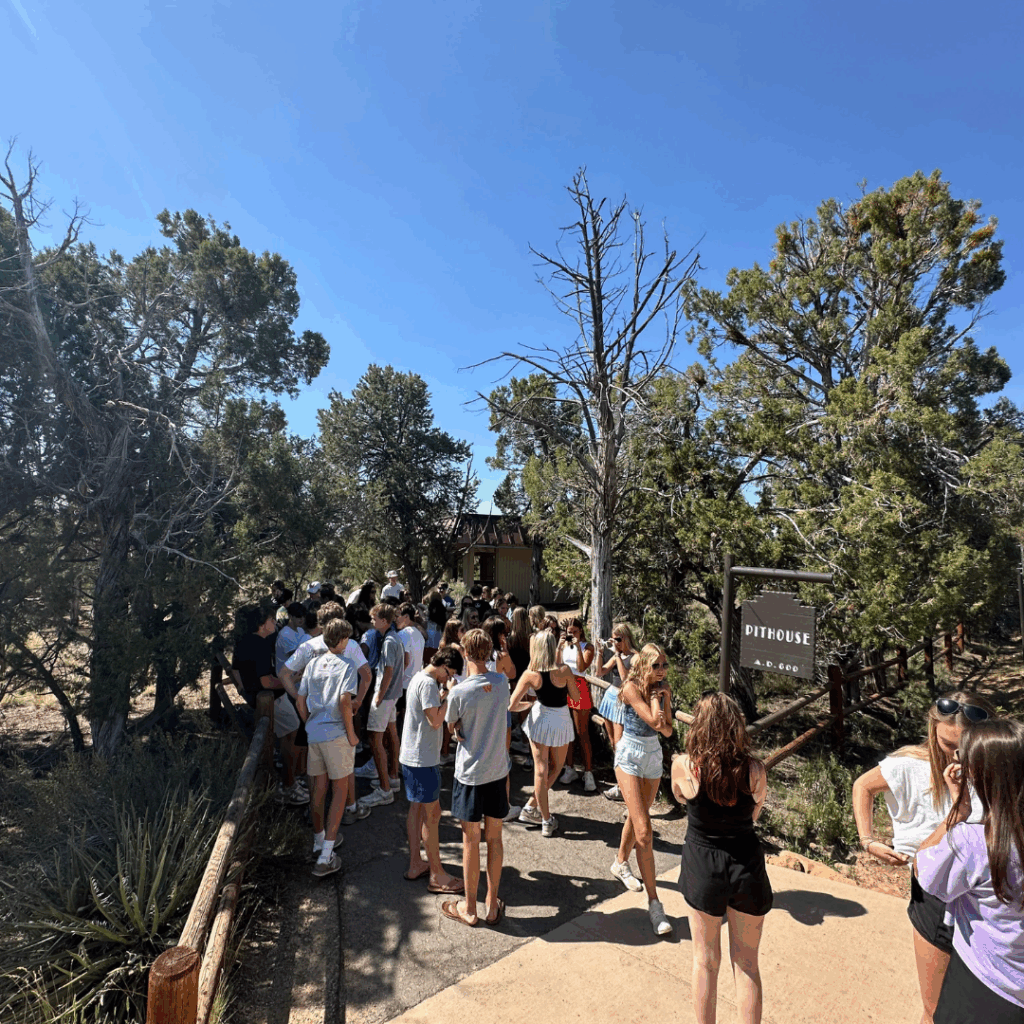 group entering the pit where they'll try new mexican cooking