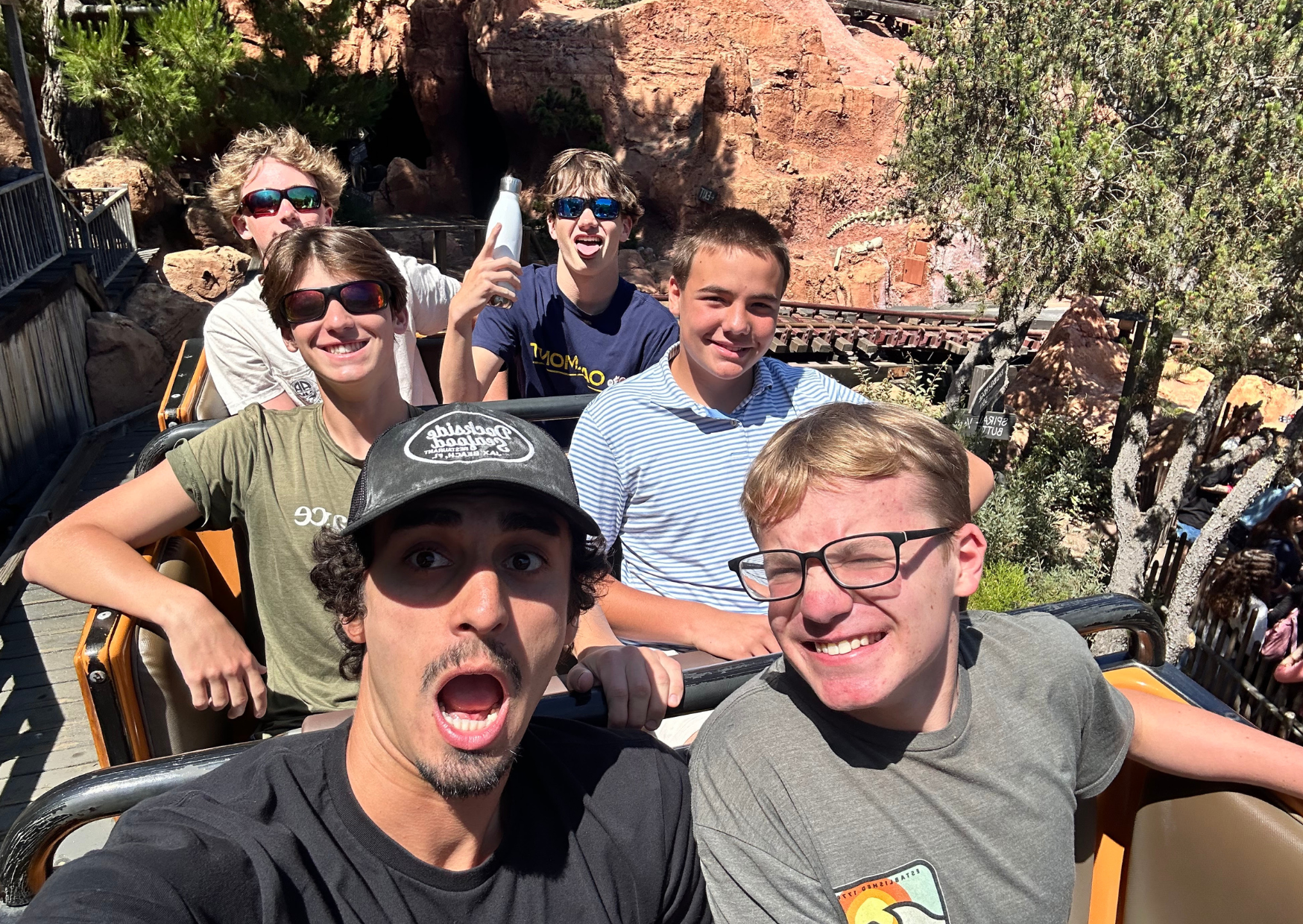 students riding in roller coaster california