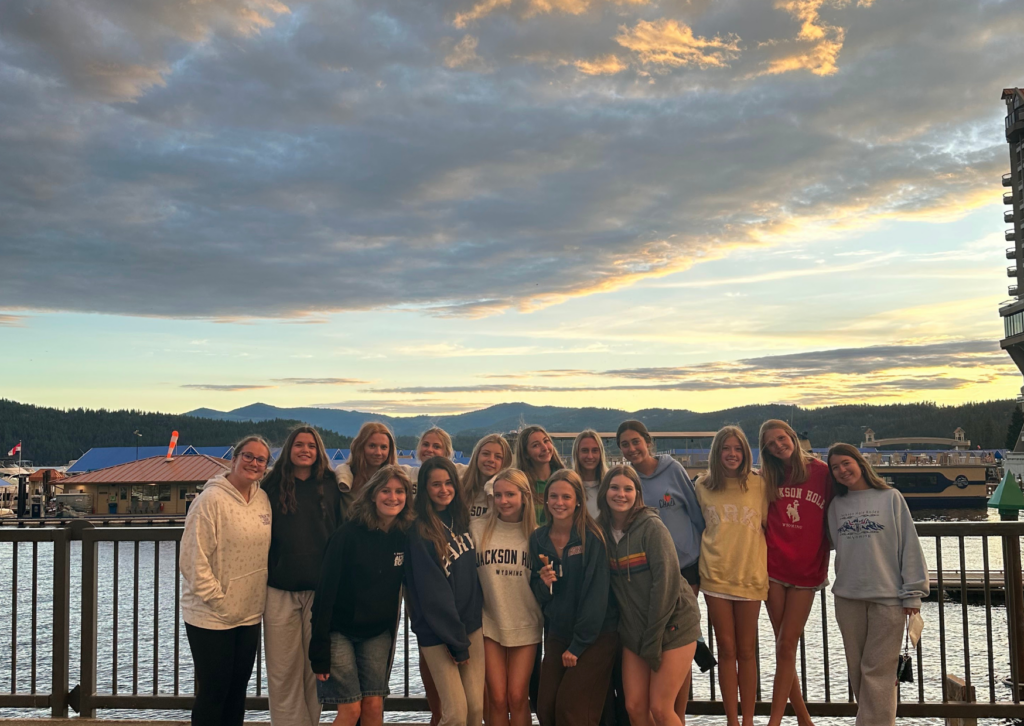 group of students standing at the harbor in seattle 