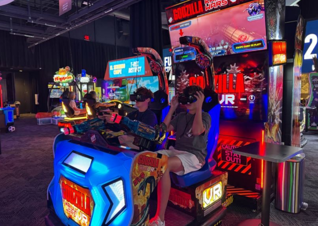 students playing in an arcade