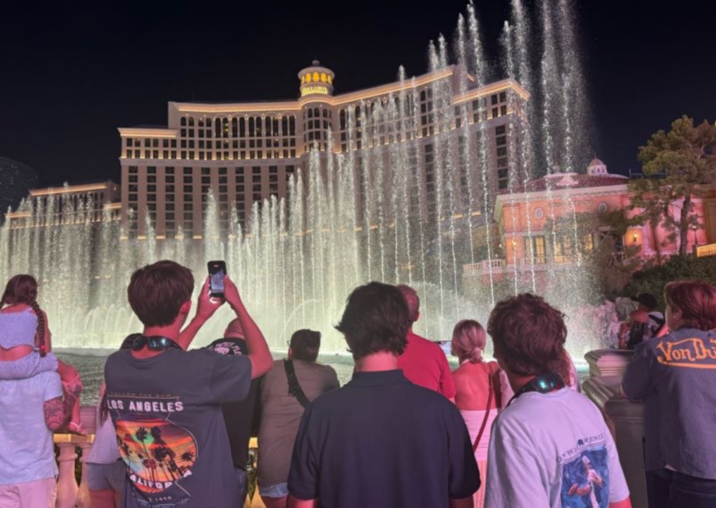 students turned away watching a water and fountain show in las vegas