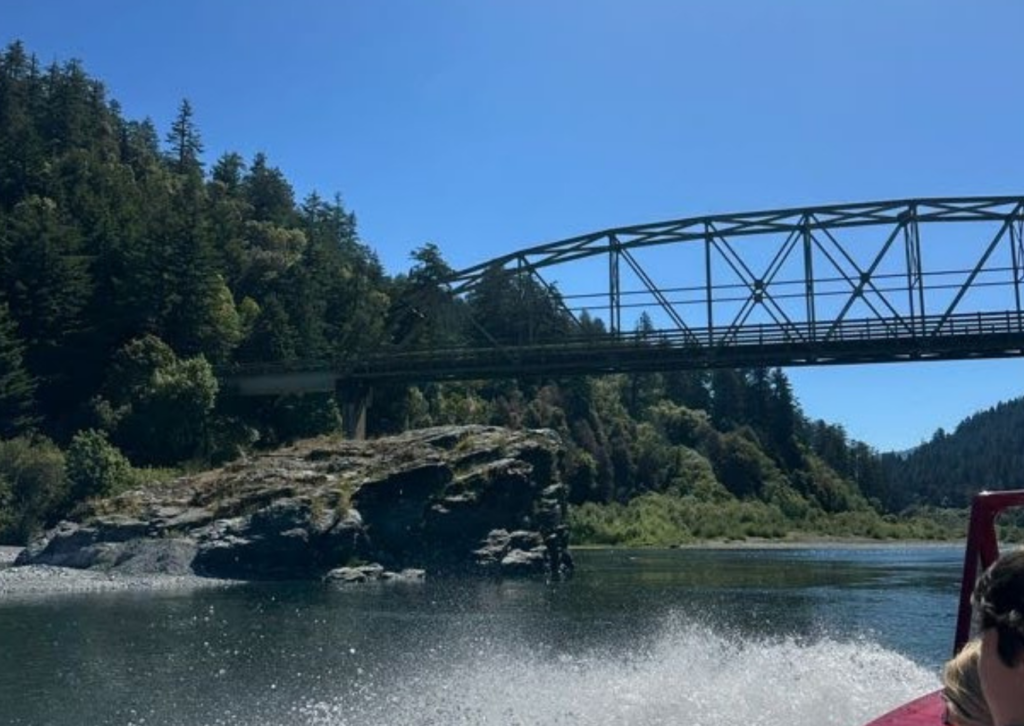 river and coastline off the edge of the rogue river from jet boat